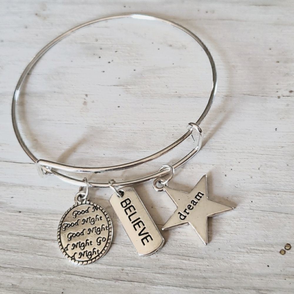 Bracelets by Sandra silver tone adjustable, Believe